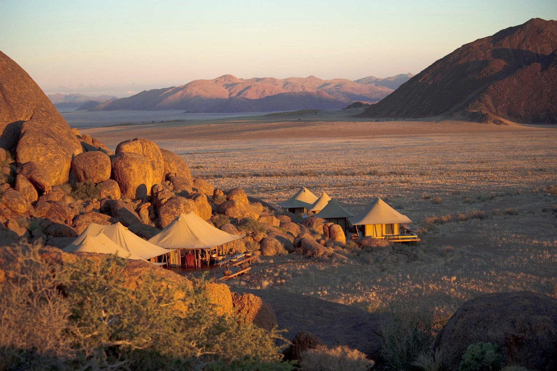Namibia desert landscape and luxury safari camp
